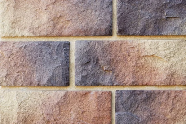 Silicate brick. Big and small. Different color. Decorative bricks. The texture of the walls.