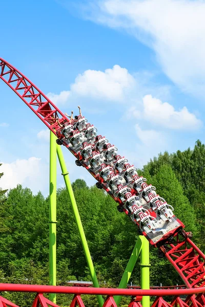 Amusement park. Roller coaster on a blue sky background. Landscape. — Stock Photo, Image