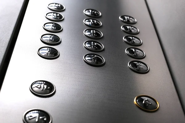 Tactile digit icons for the visually impaired. Elevator buttons. Selective focus close-up. — Stock Photo, Image