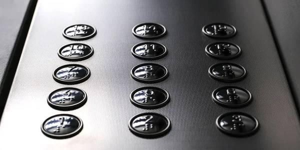 Tactile digit icons for the visually impaired. Elevator buttons. Selective focus close-up. — Stock Photo, Image