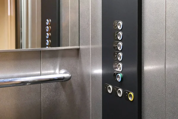 Tactile digit icons for the visually impaired. Elevator buttons. Selective focus close-up. — Stock Photo, Image