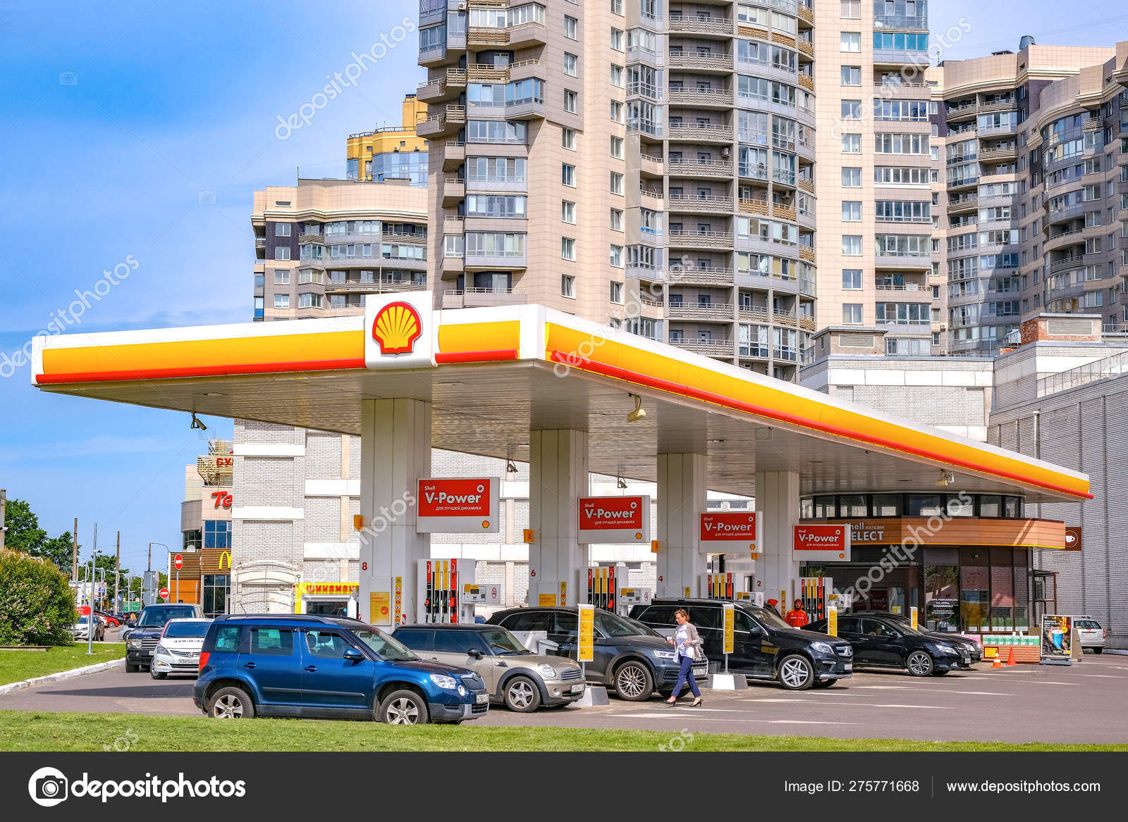 Shell gas station on the background of a Modern multi-storey