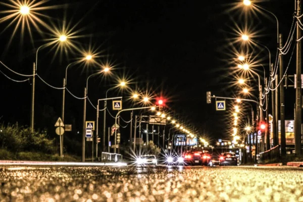 Fundo, borrão, desfocado, bokeh. As luzes de freio vermelhas de carros parados. — Fotografia de Stock