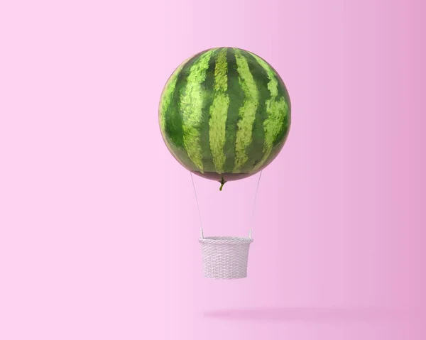 Büyük sıcak hava balon karpuz kavramı kopya alanı metin için pastel pembe zemin üzerine. mutlu tatil uçan balonlar. En az yaratıcı kavramı. 