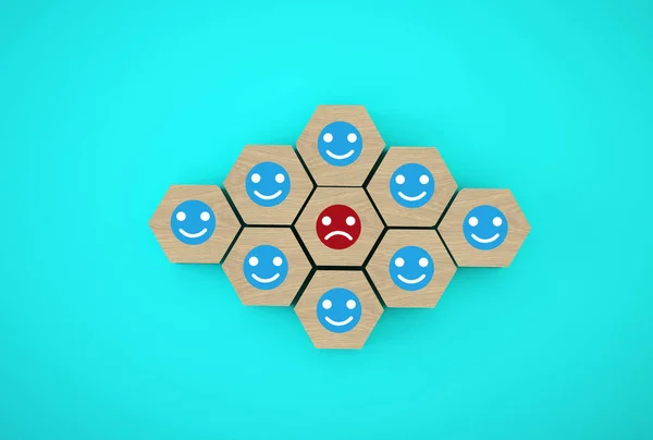 Abstract of face emotion happiness and sadness, Unique, think different, individual and standing out from the crowd concept. Wooden hexagon with icon on blue background.