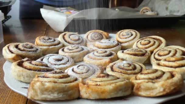 Baked Cinnabons Sprinkled Powdered Sugar — Stock Video