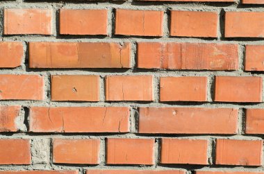 Turuncu tuğla duvar dokusu arkaplanı.