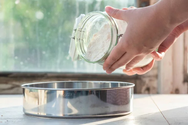 Woman Sprinkles Flour Sieve Can Close — Stock Photo, Image