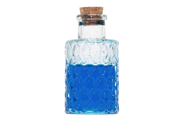 蓝色液体装在一个白色背景隔离的瓶子里 — 图库照片