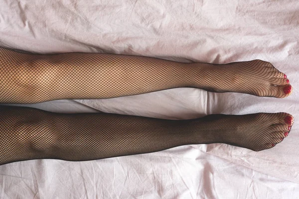 Woman Legs Brown Stocking Left Leg Black Stocking Right Choosing — Stock Photo, Image