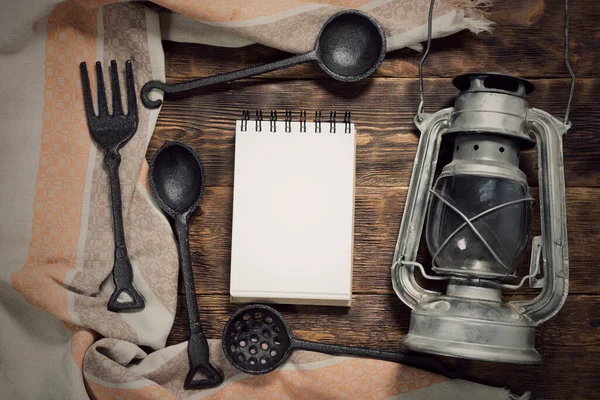 Food menu or product list mock up. Blank pages notepad on a wooden kitchen table background.