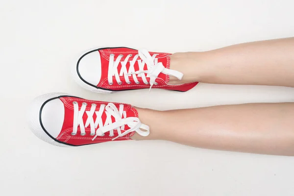 Red Gumshoes Female Legs White Background Top View — Stock Photo, Image