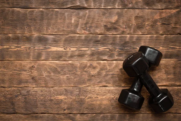 Black Dumbbells Wooden Floor Flat Lay Background Copy Space — Stock Photo, Image