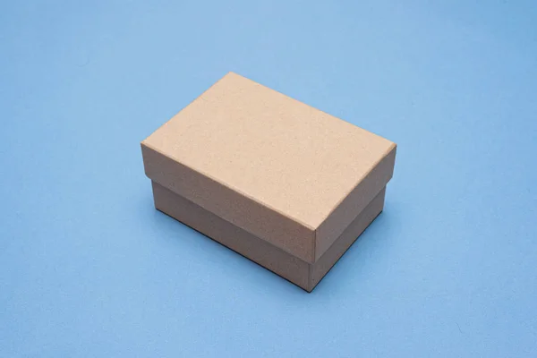 Brown Closed Cardboard Box Blue Background — Stock Photo, Image