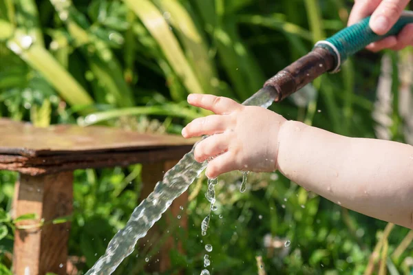 Little Child Washing His Hand Water Water Hose Garden Stock Image