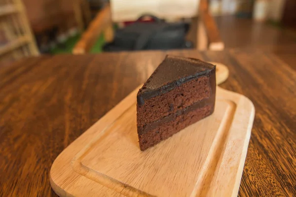 Close Slice Chocolate Cake Frok Wood Table — Stock Photo, Image