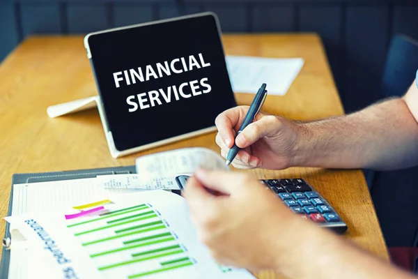 Financial services with businessman inspector calculating bills or checking balance - Business adviser analyzing financial results - Internal Revenue Service with bookkeeper hands on tax documents