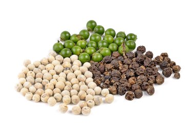 beyaz zemin üzerine biber tohumları