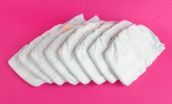 Baby diapers on a pink background, diaper — Stock Photo, Image
