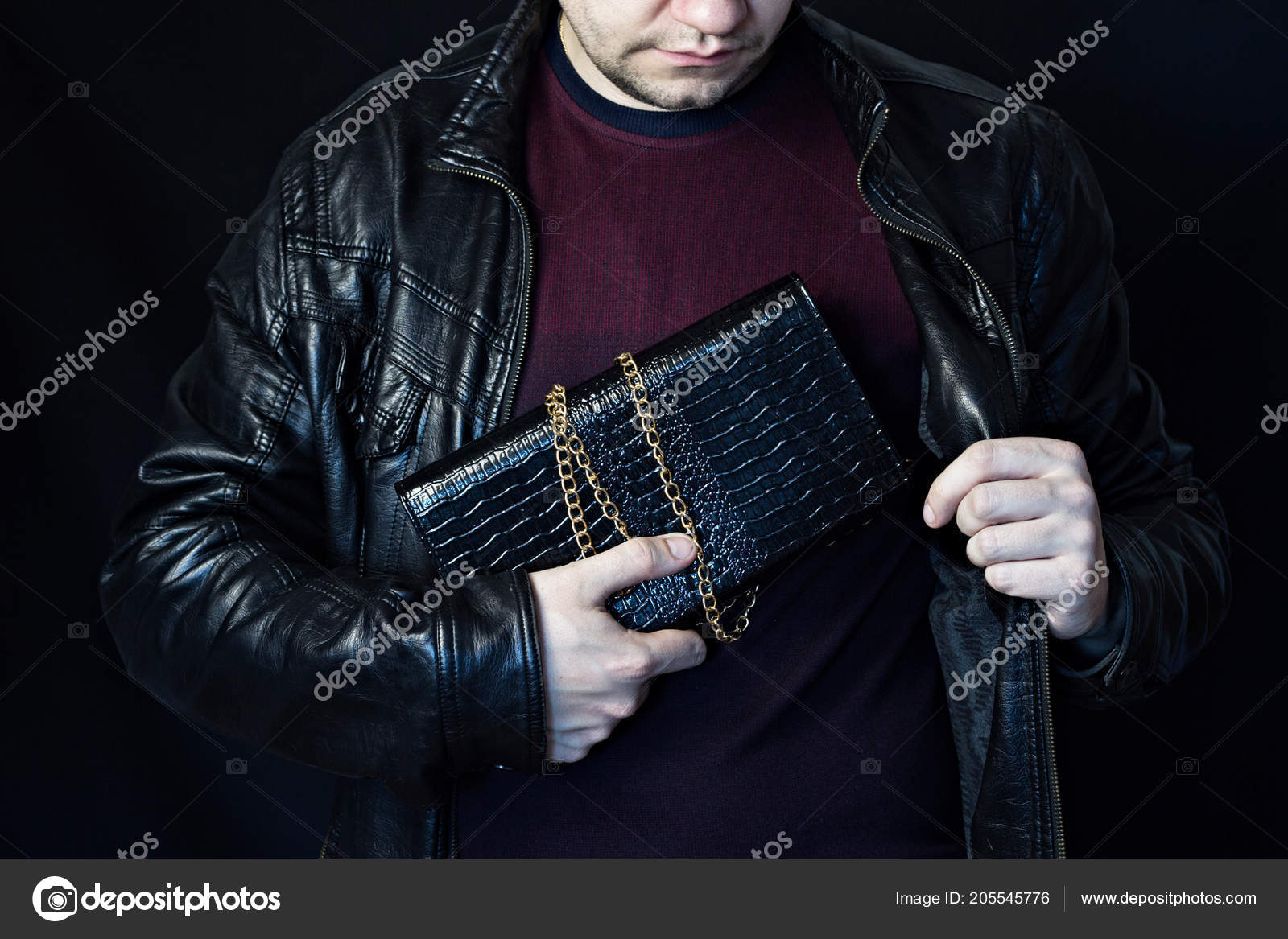 A Man Hides A Woman S Handbag In His Bosom The Theft Of A Handbag