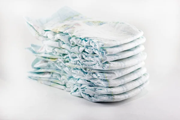 Pampers em um fundo branco — Fotografia de Stock