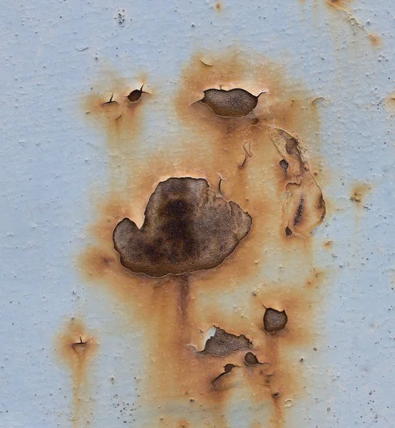 Corrosion of metal on a blue background, texture — Stock Photo, Image