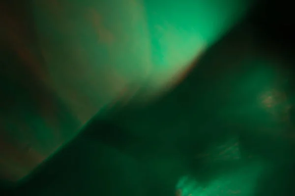 Clarão de lente brilho de luz abstrato. flash abstrato óptico. desfocado suave. fundo verde, textura — Fotografia de Stock