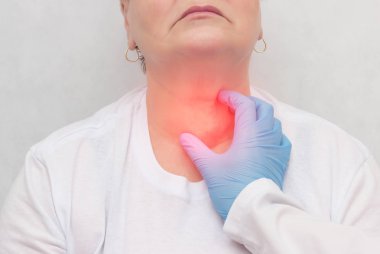 Doctor feels the thyroid gland in a patient of an adult woman, thyroid cancer, close-up, node clipart