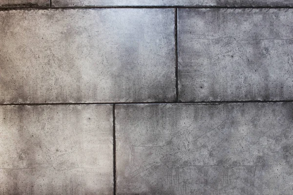 Textura de cinza parede elegante de blocos de concreto, close-up, fundo, tenacidade — Fotografia de Stock