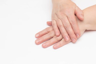 The hands of an elderly woman on a white background which has skin problems, dry and cracked skin on the hands, wrinkles, close-up, isolate, copy space, elasticity clipart
