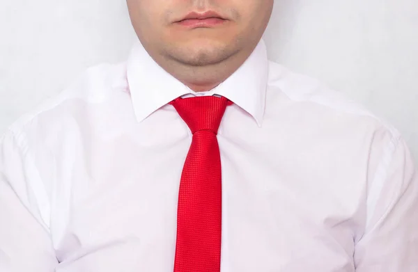 Office worker caucasian man with overweight in a tie with a problematic double chin on a white background, diet — Stock Photo, Image