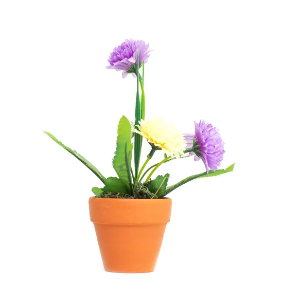 A pot with artificial flowers of purple and yellow chrysanthemums on a white background, isolate — Stock Photo, Image