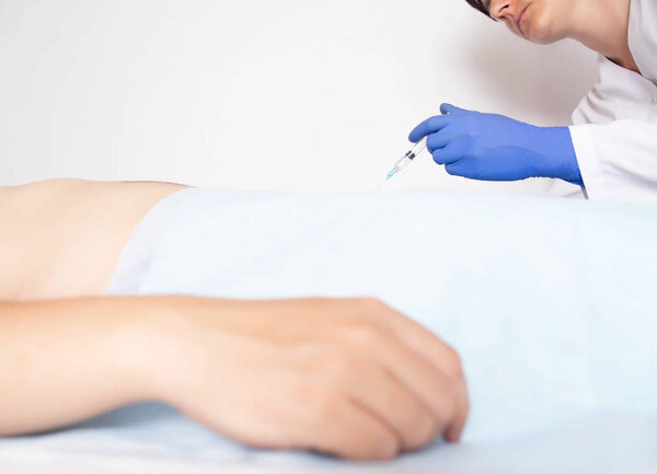 Modern treatment of male infertility due to the venous plexus of varicocele veins of the scrotum in men, treatment of varicocele with sclerotherapy, non-surgical procedure