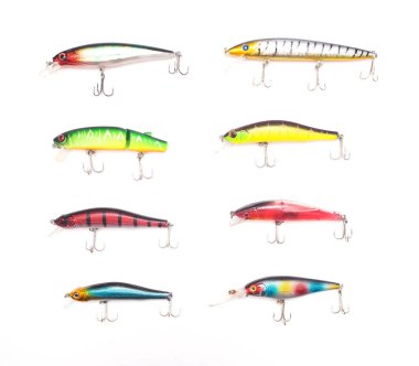 Multicolored lure baubles and wobblers for fishing on a white background, isolate, fishing gear clipart
