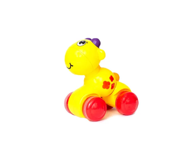 Żółta zabawka dziecięca żyrafa na białym tle, Izoluj — Zdjęcie stockowe
