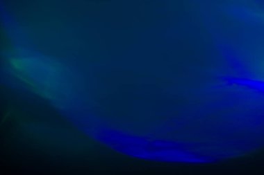 Bulanık mercek parlaması. Odaklanamayan renkli ışıklar. Parlak parlayan noktalar, soyut arkaplan ve doku, kopyalama alanı