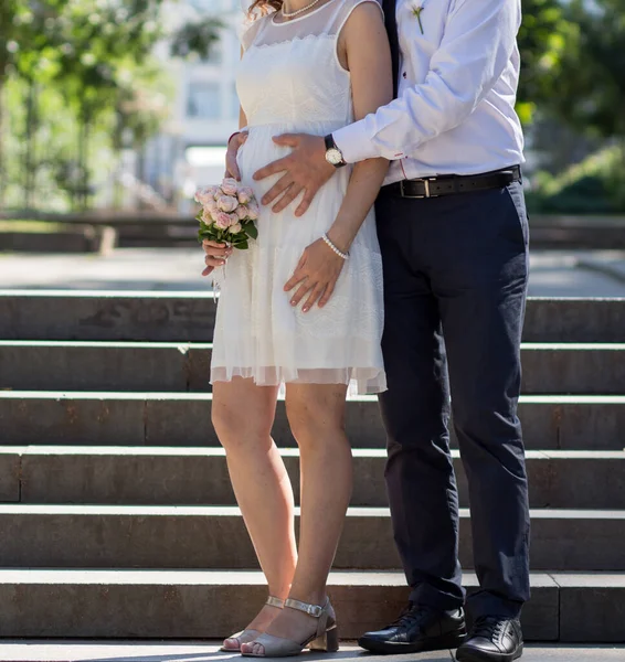 Newlyweds Hold Bouquet Together — Stock Photo, Image