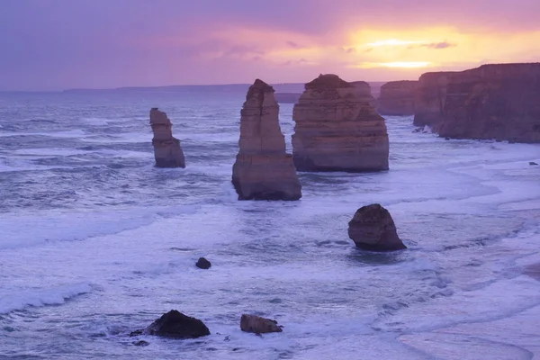 The Twelve Apostles, famous Australian coastline formations, seen at sunset