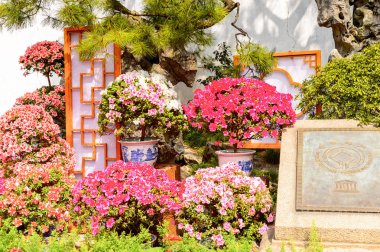 Suzhou, Çin - Nis 1, 2016: Mütevazı Yönetici Bahçesi' nde Unesco işareti, Suzhou bir Çin bahçesi, Unesco Dünya Mirası