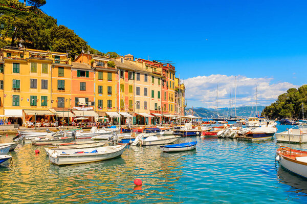 PORTOFINO, ITALY - MAY 4, 2016: Portofino, an Italian fishing village, Genoa province, Italy. A vacation resort with celebrity and artistic visitors.