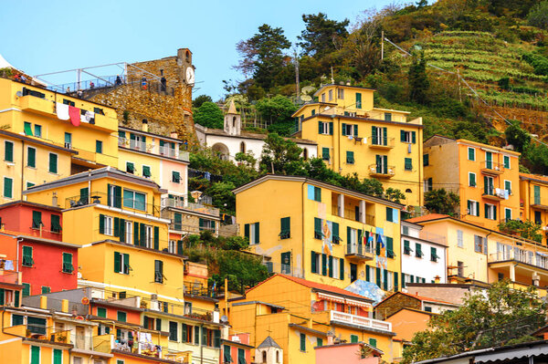 RIOMAGGIORE, ITALY - MAY 5, 2016: Riomaggiore, a village in province of La Spezia, Liguria, Italy. It's one of the lands of Cinque Terre, UNESCO World Heritage Site