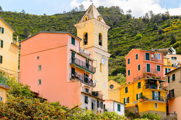 MANAROLA, ITALY - MAY 5, 2016: Colourful architecture of Manarola (Manaea), La Spezia, Liguria, Italy. It's one of the lands of Cinque Terre, UNESCO World Heritage Site
