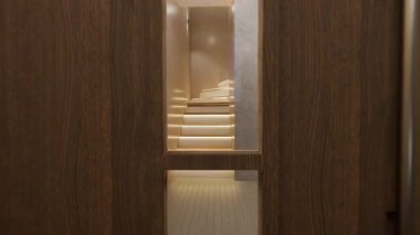 Birinci katta açık oturma odası ve mutfak alanı olan üç boyutlu parlak, modern bir iç mekan. Şık merdivenler ikinci kata çıkıyor. Hafif ve havadar, minimalist elementler ve rahat atmosferli çağdaş tasarım.. 