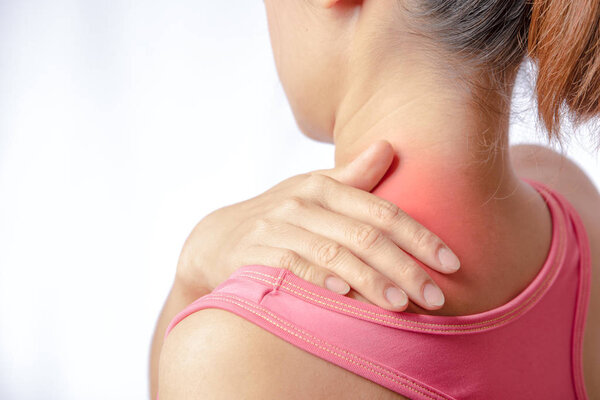 woman pain at trapezius muscle and holding right hand on muscle, swelling and inflammation of left rotator cuff muscle 