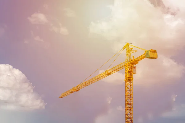 working crane for big building with blue sky and cloud