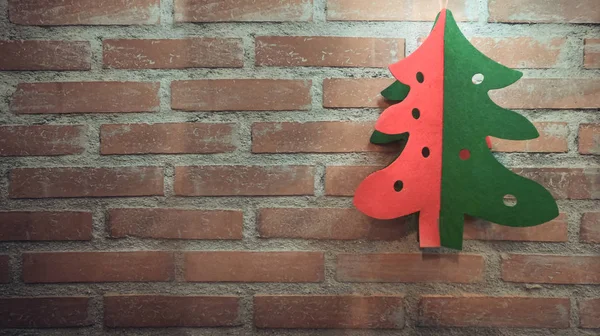 Kağıt kesme Noel ağacı bir tuğla duvar arka plan üzerinde afiş