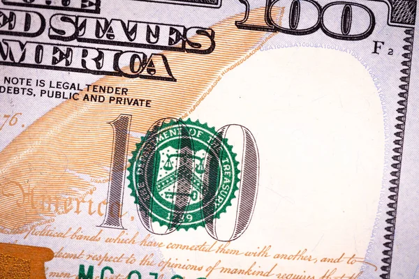 Fragmento de billete de 100 dólares. Fondo del dólar estadounidense.. Macro tiro . — Foto de Stock