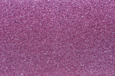 Gül folyo arka plan parıltısı. Noel tatili için parlak, soyut bir arka plan ambalaj kağıdı.