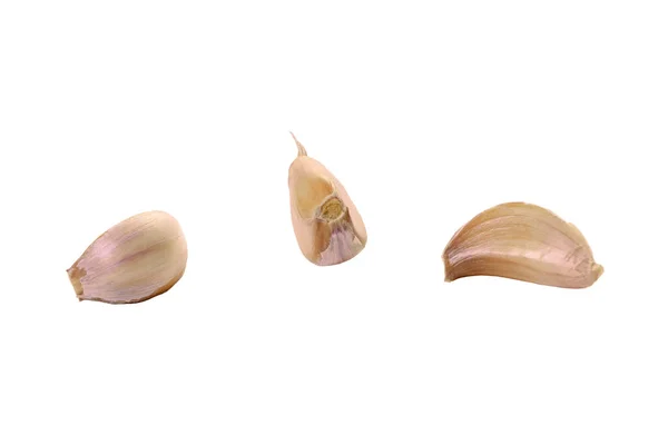 Collection of fresh sliced garlic cloves, isolated on white background — Stock Photo, Image