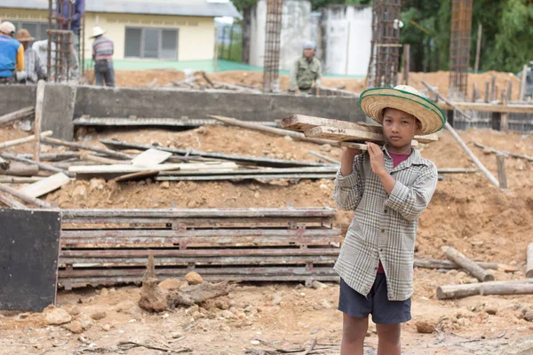 Children working at construction site, Violence children and trafficking concept,Anti-child labor, Rights Day on December 10.